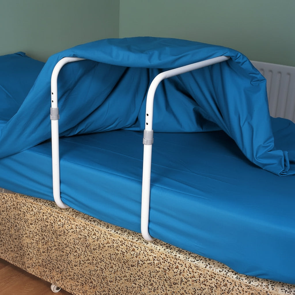Homecraft Adjustable Bed Cradle full view showing two-part frame and adjustable height for keeping covers off legs and feet