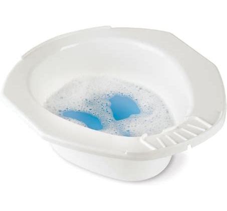 Top view of the Homecraft portable bidet showing aperture size of 240 by 280mm and soap dish.