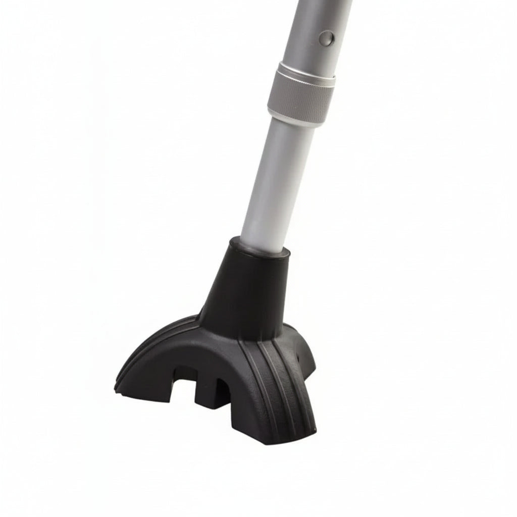 Walking cane fitted with Alpha Tri‑Leg cane tip standing on three legs for added stability