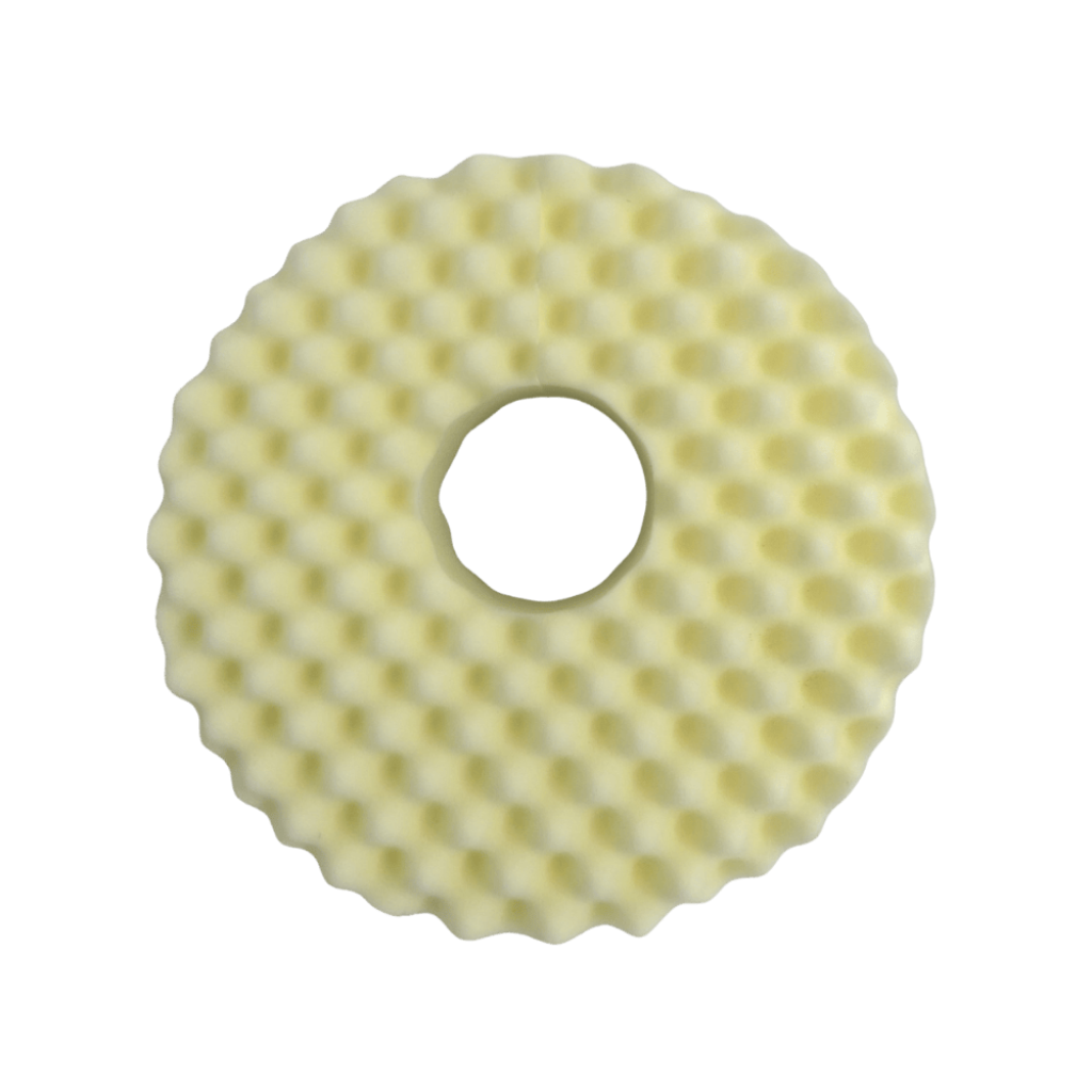 Close-up of convoluted foam texture on BeMed Cushion with white pillow slip.