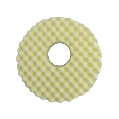 Close-up of convoluted foam texture on BeMed Cushion with white pillow slip.