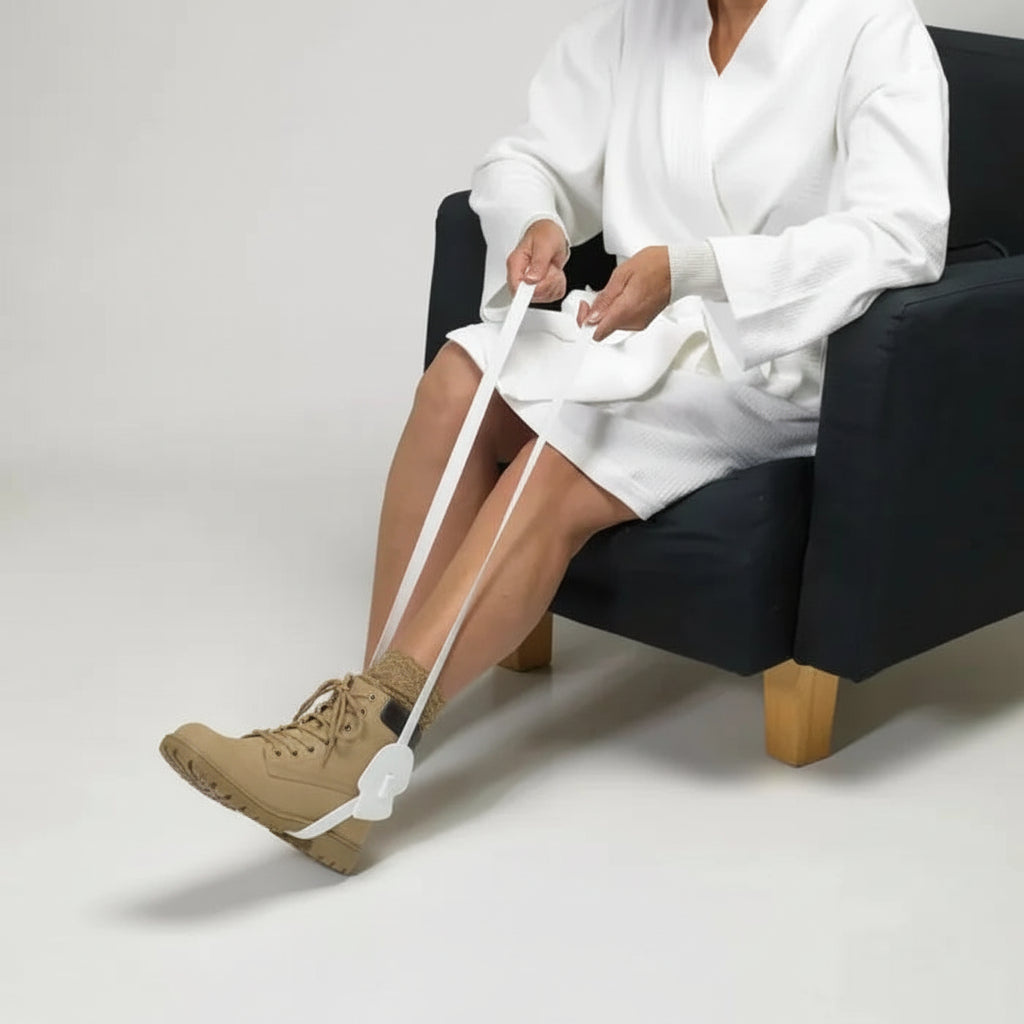 Homecraft Dorking Stocking Aid full view showing plastic gutter and long cotton tapes for easy sock application