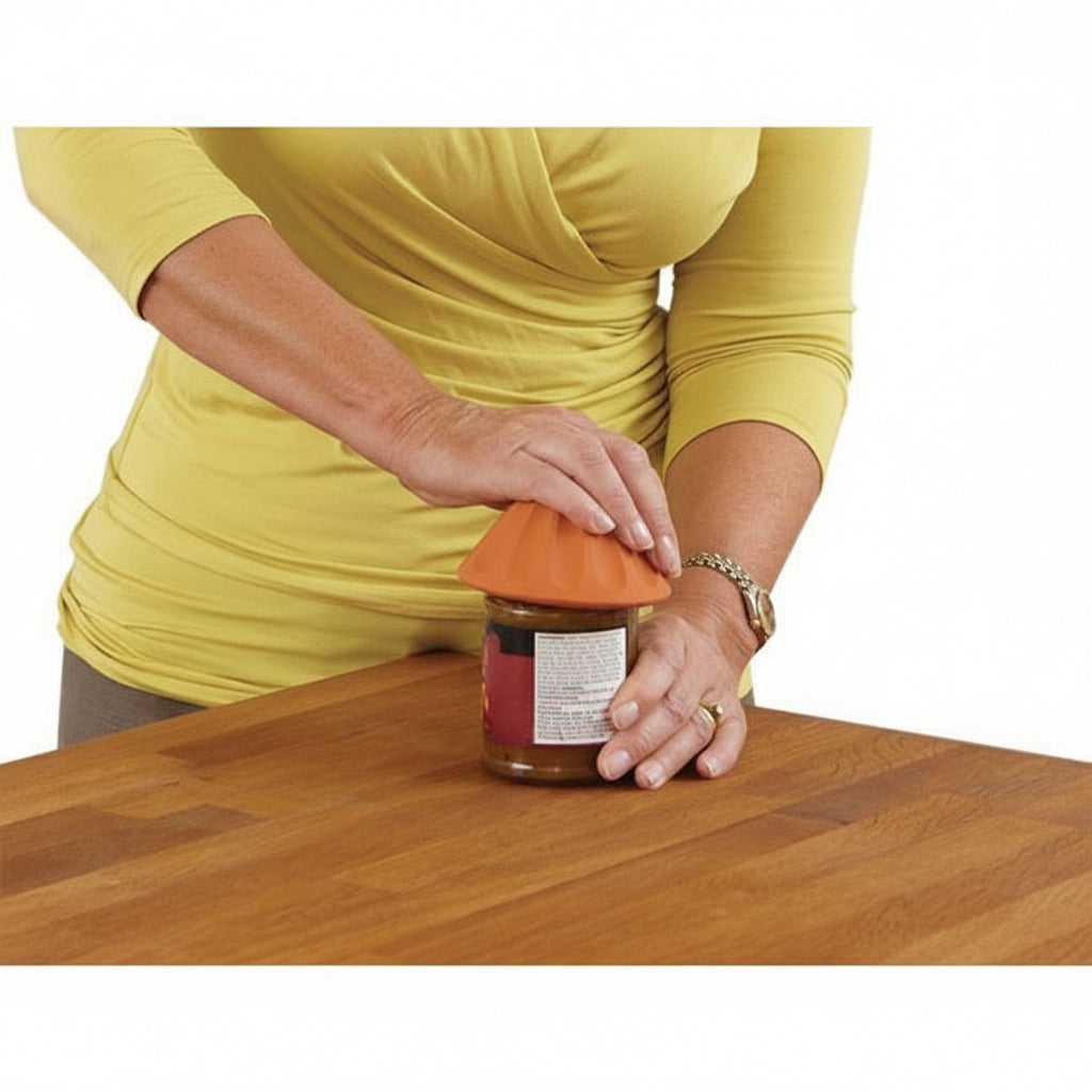 Person using the ergonomic Homecraft Twister Jar Opener to easily twist off a stubborn jar lid.