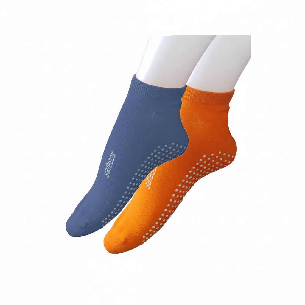 Close-up of Safesox slip-resistant dot pattern on the sole for indoor traction.