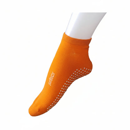 Safesox premium slip-resistant socks in orange with dot-grip pattern